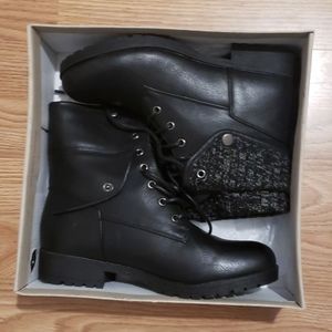 Jessica Cline black boots